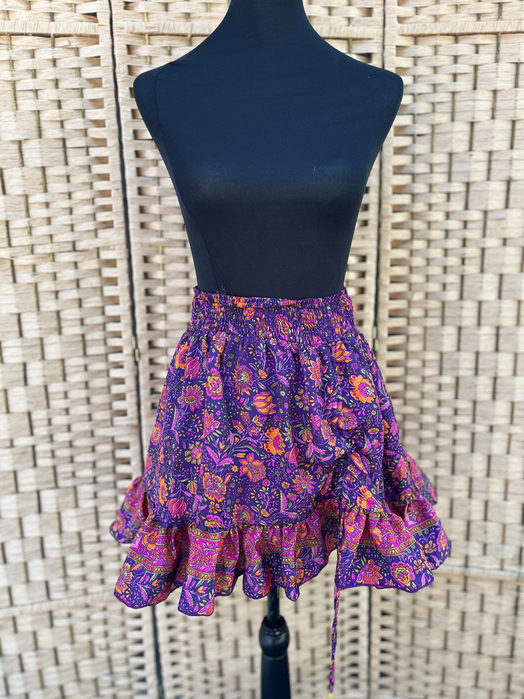 Mini Cinch Skirt fits a small to XL waist.