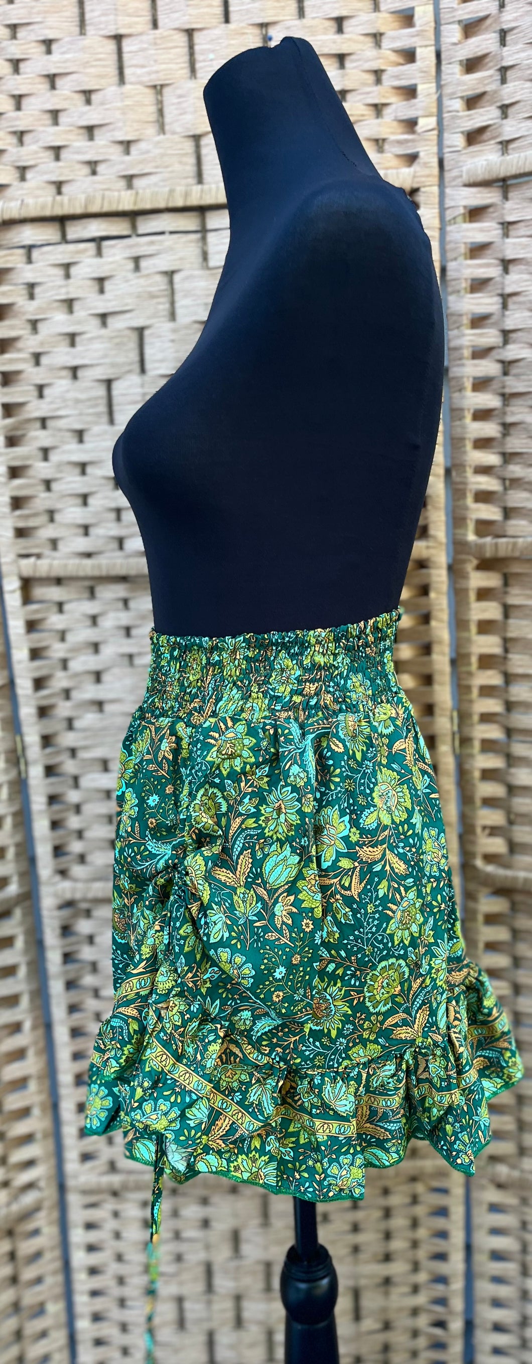 Mini Cinch Skirt fits a small to XL waist.